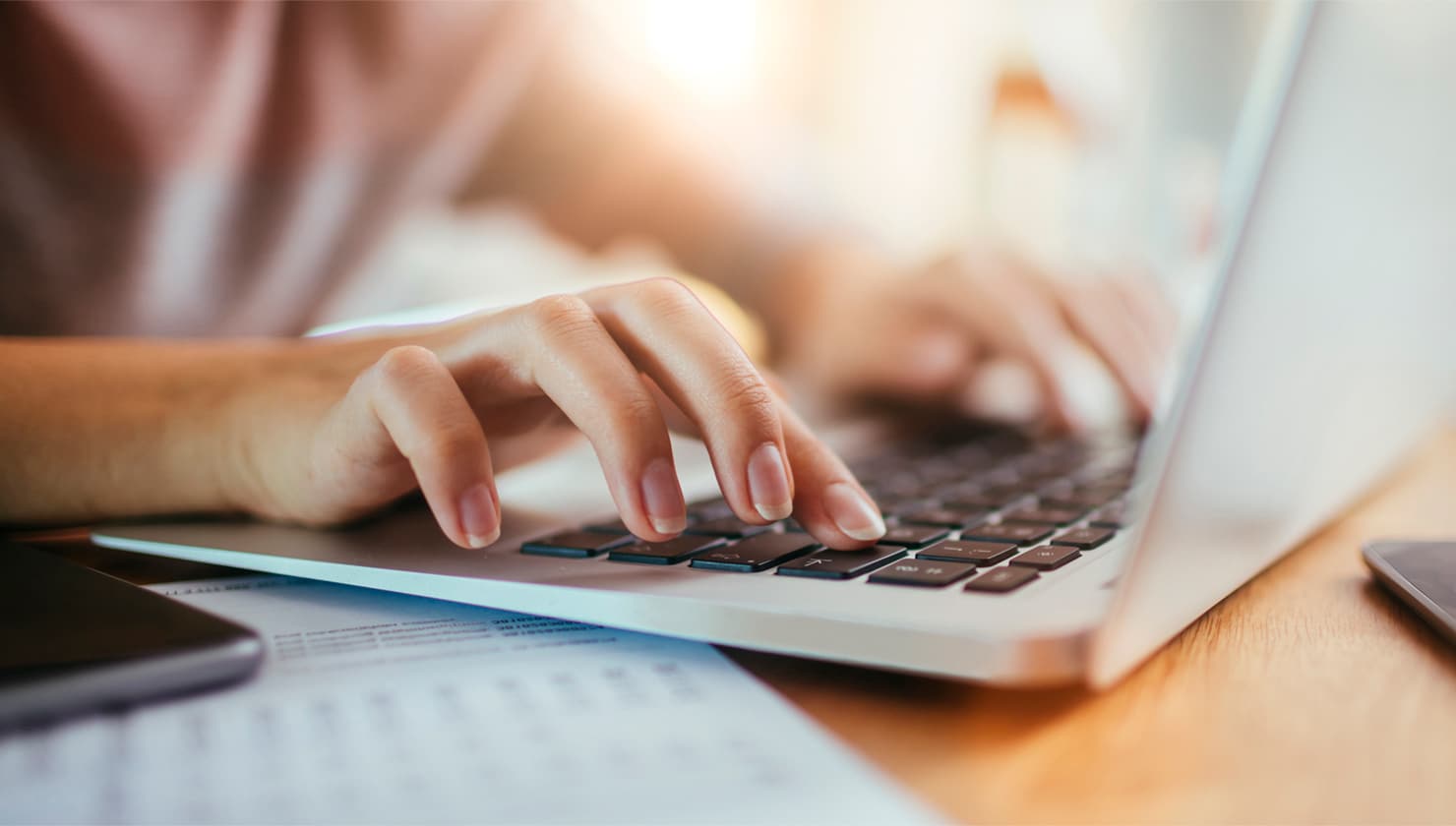 person typing on computer