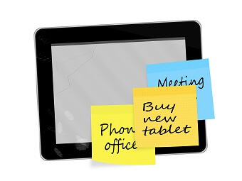 tablet computer with postit note on with message buy new tablet